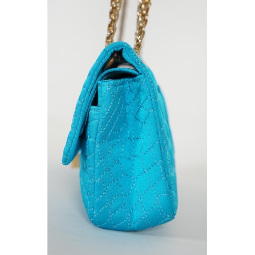 1136 - A Chanel medium-sized 2-55 bag in turquoise blue silk satin stitched with a quilted crocodile patter... 