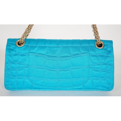 1136 - A Chanel medium-sized 2-55 bag in turquoise blue silk satin stitched with a quilted crocodile patter... 