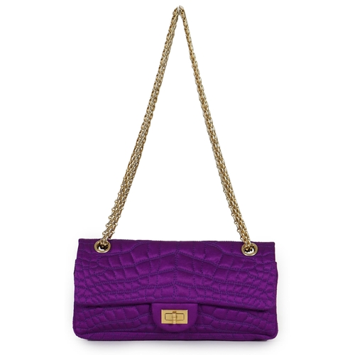 1137 - A Chanel medium-sized 2-55 bag in purple silk satin stitched with a quilted crocodile pattern, embel... 