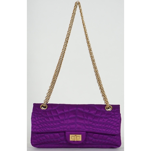 1137 - A Chanel medium-sized 2-55 bag in purple silk satin stitched with a quilted crocodile pattern, embel... 