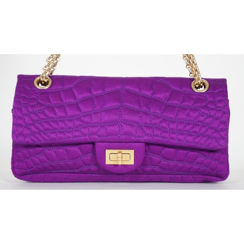 1137 - A Chanel medium-sized 2-55 bag in purple silk satin stitched with a quilted crocodile pattern, embel... 