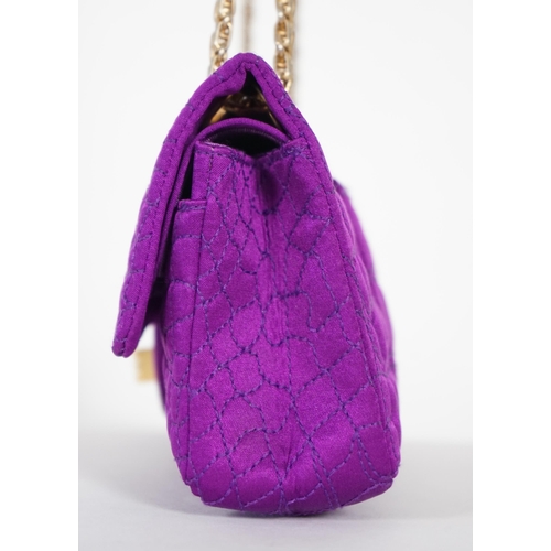 1137 - A Chanel medium-sized 2-55 bag in purple silk satin stitched with a quilted crocodile pattern, embel... 