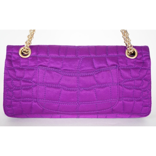 1137 - A Chanel medium-sized 2-55 bag in purple silk satin stitched with a quilted crocodile pattern, embel... 