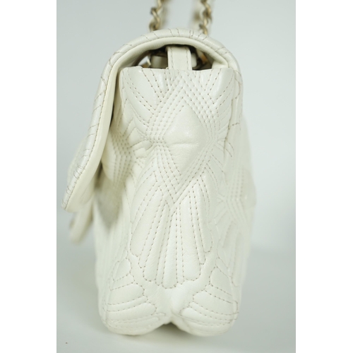 1139 - ** ** A white quilted Chanel shoulder bag, with makers dust bag, Authentication no: 13198167 (no ca... 