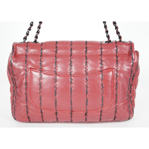 1140 - ** ** A Chanel Classic Jumbo Flap burgundy lambskin quilted shoulder bag, with pinstripe stitching, ... 