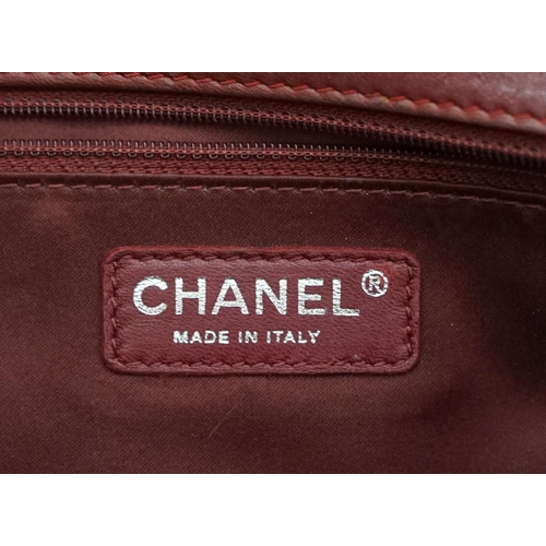 1140 - ** ** A Chanel Classic Jumbo Flap burgundy lambskin quilted shoulder bag, with pinstripe stitching, ... 