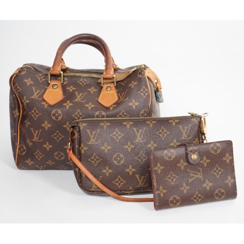 1142 - A vintage Louis Vuitton Monogram canvas Speedy 25 handbag, a Louis Vuitton Pochette Accessories Canv... 