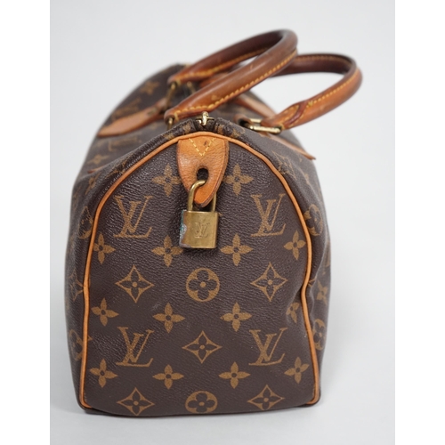 1142 - A vintage Louis Vuitton Monogram canvas Speedy 25 handbag, a Louis Vuitton Pochette Accessories Canv... 