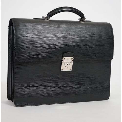 1144 - A Louis Vuitton Robusto briefcase in black taiga leather, hardware in silver metal, simple handle le... 