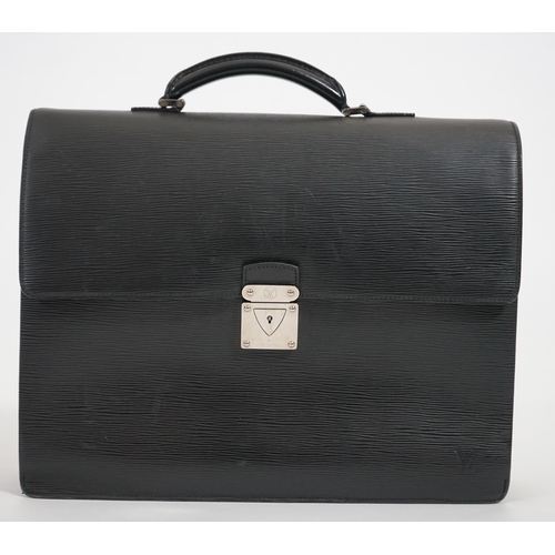 1144 - A Louis Vuitton Robusto briefcase in black taiga leather, hardware in silver metal, simple handle le... 