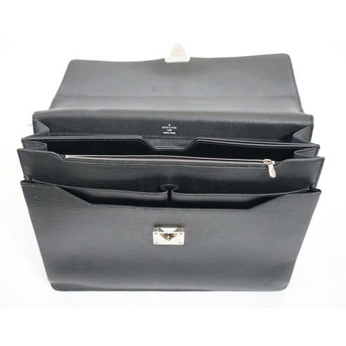 1144 - A Louis Vuitton Robusto briefcase in black taiga leather, hardware in silver metal, simple handle le... 