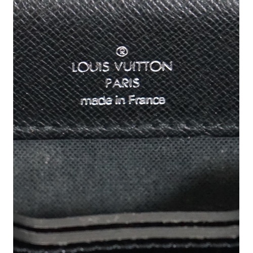 1144 - A Louis Vuitton Robusto briefcase in black taiga leather, hardware in silver metal, simple handle le... 