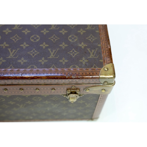 1145 - A Louis Vuitton monogram canvas and tan leather suitcase, with label for Paris and Nice number 19849... 