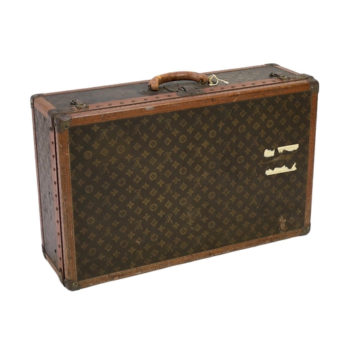 1148 - A vintage Louis Vuitton suitcase with monogram canvas and tan leather, initialled A.D, interior with... 