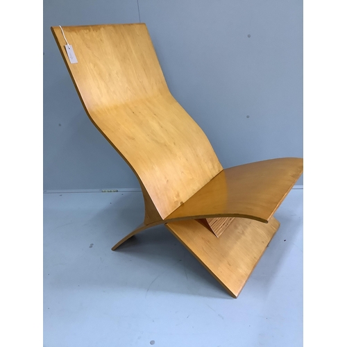 1161 - In the manner of Jens Nielson, a mid century bent ply two section chair, width 56cm, depth 80cm, hei... 