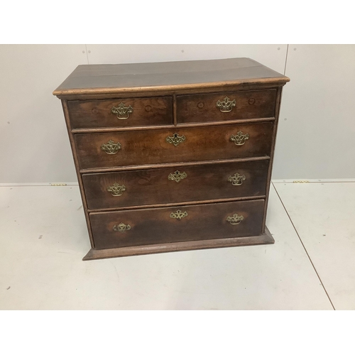 1203 - A mid 18th century oak chest of two short and three long drawers, width 97cm