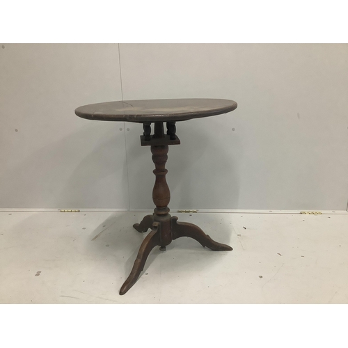 1204 - A mid 18th century oak tripod table with bird cage stem, width 60cm, height 63cm