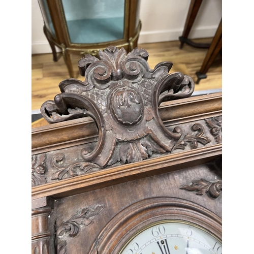 1217 - A late 19th century French carved walnut wall clock combined thermometer and barometer, dial and mov... 