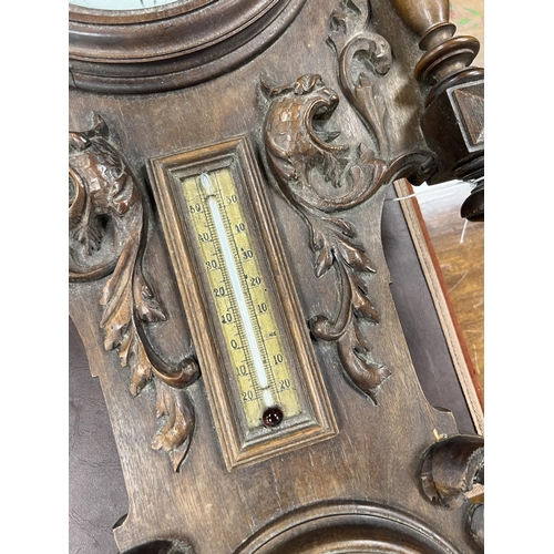 1217 - A late 19th century French carved walnut wall clock combined thermometer and barometer, dial and mov... 