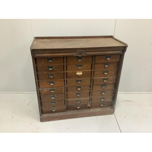 1235 - An early 20th century oak Globe Wernicke office filing cabinet with tambour front, width 106cm, heig... 