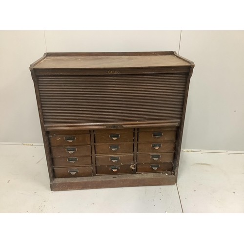 1235 - An early 20th century oak Globe Wernicke office filing cabinet with tambour front, width 106cm, heig... 