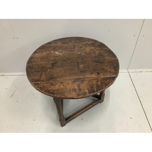 1266 - A late 18th century oak cricket table, diameter 64cm, height 55cm