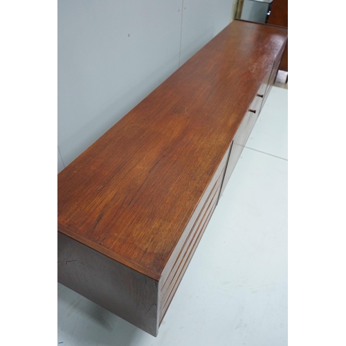 1277 - In the manner of Arne Vodder, a mid century teak sideboard width 221cm, depth 45cm, height 73cm.... 