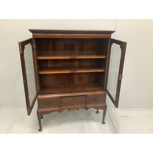 1283 - An Edwardian inlaid mahogany bookcase, width 112cm, height 152cm