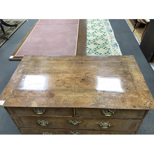 129 - An 18th century  feather banded walnut chest of two short and three long drawers, width 96cm, depth ... 