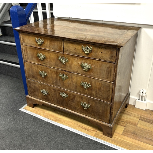 129 - An 18th century  feather banded walnut chest of two short and three long drawers, width 96cm, depth ... 