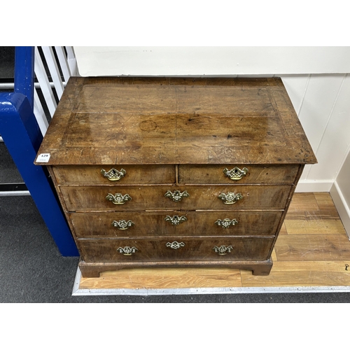 129 - An 18th century  feather banded walnut chest of two short and three long drawers, width 96cm, depth ... 