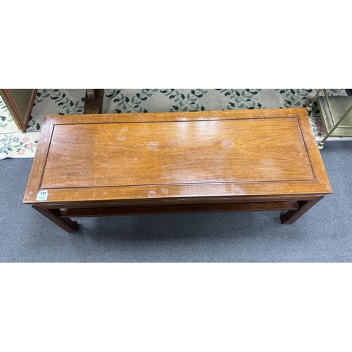 140 - A Chinese rectangular hardwood two tier coffee table, width 122cm, depth 43cm, height 46cm