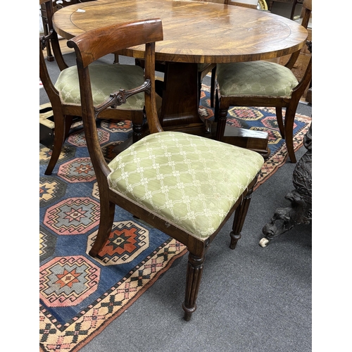 151 - A Regency circular rosewood tilt top breakfast table, diameter 121cm, height 71cm together with four... 