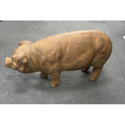 182 - A resin model of a pig, length 76cm