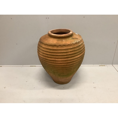 3 - A Greek style terracotta oil jar, height 76cm