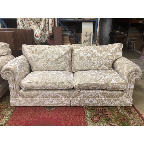 31 - Two Duresta two seat sofas and a matching rectangular footstool, larger sofa width 220cm, depth 96cm... 