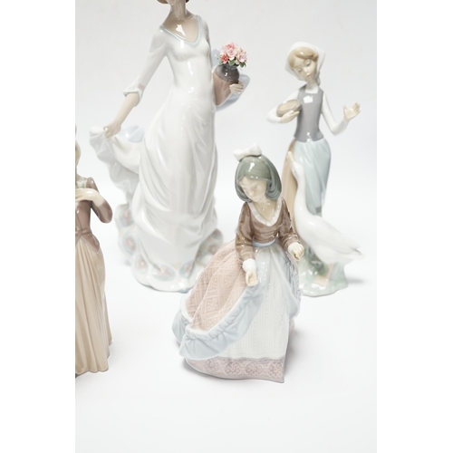 421 - Four Lladro figurines; Reverie Moment, a model of a Ballet Dancer, and three other figurines (only t... 