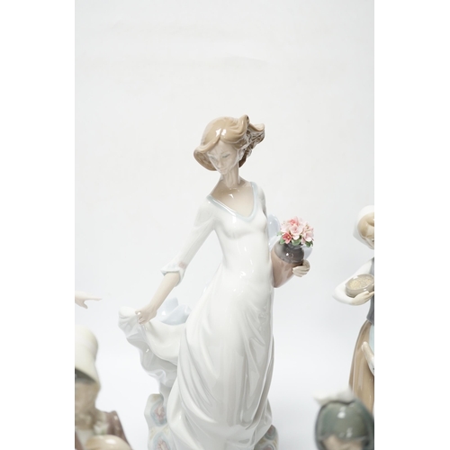 421 - Four Lladro figurines; Reverie Moment, a model of a Ballet Dancer, and three other figurines (only t... 