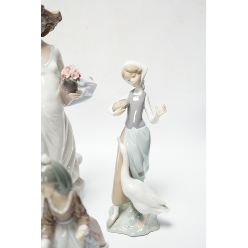 421 - Four Lladro figurines; Reverie Moment, a model of a Ballet Dancer, and three other figurines (only t... 