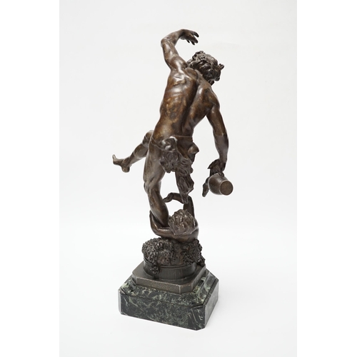 422 - A bronzed spelter dancing figure of Bacchus - Le Vin, with a fawn and bunches of grapes, on a marb... 