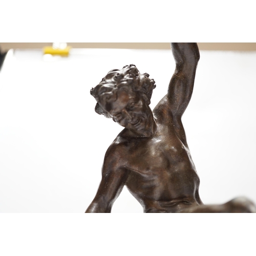 422 - A bronzed spelter dancing figure of Bacchus - Le Vin, with a fawn and bunches of grapes, on a marb... 