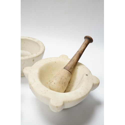 436 - Four mortars and three pestles, largest 23cm wide