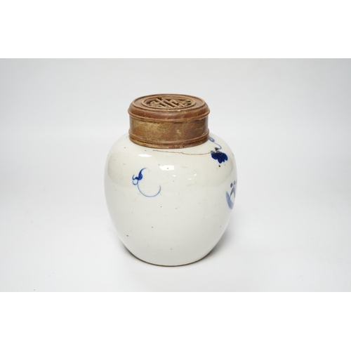 441 - A Chinese blue and white jar, 19th century, with pierced hardwood lid, 15cm high