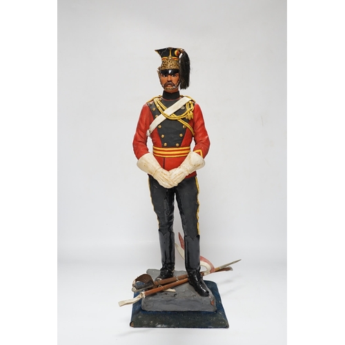 456 - A painted plaster figure of a lancer, 48cm