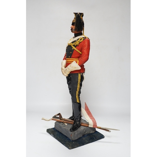 456 - A painted plaster figure of a lancer, 48cm