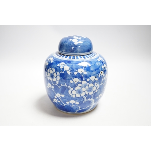 468 - An early 20th century Chinese blue and white prunus jar and cover, 14cm