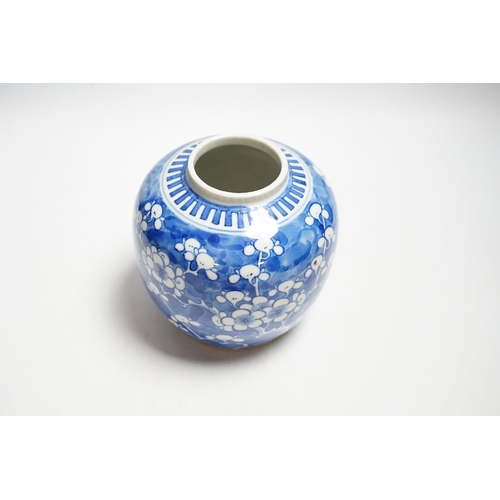 468 - An early 20th century Chinese blue and white prunus jar and cover, 14cm