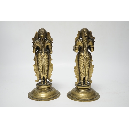 481 - A pair of 19th century Indian Deepalakshni butter oil lamps, 19cm high, Provenance: acquired on tr... 