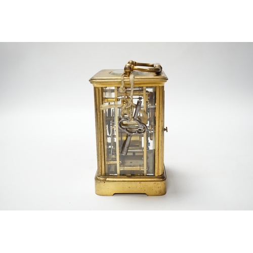 490 - A brass carriage clock with subsidiary dial, 16cm high