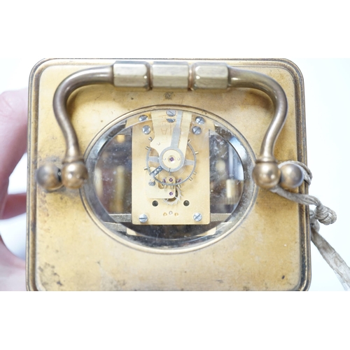 490 - A brass carriage clock with subsidiary dial, 16cm high